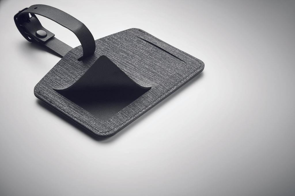 Etichetă anti-pierdere bagaje